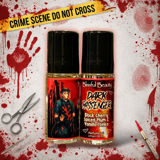Dark Passenger perfume oil by Blissful Beauty — 1 oz roller bottle with cherry, spiced plum, and vanilla tonka fragrance. Second bottle shows wrap-around artwork.